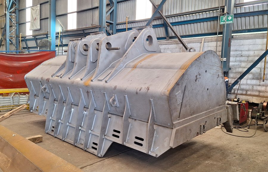 Heavy equipment bucket fabrication