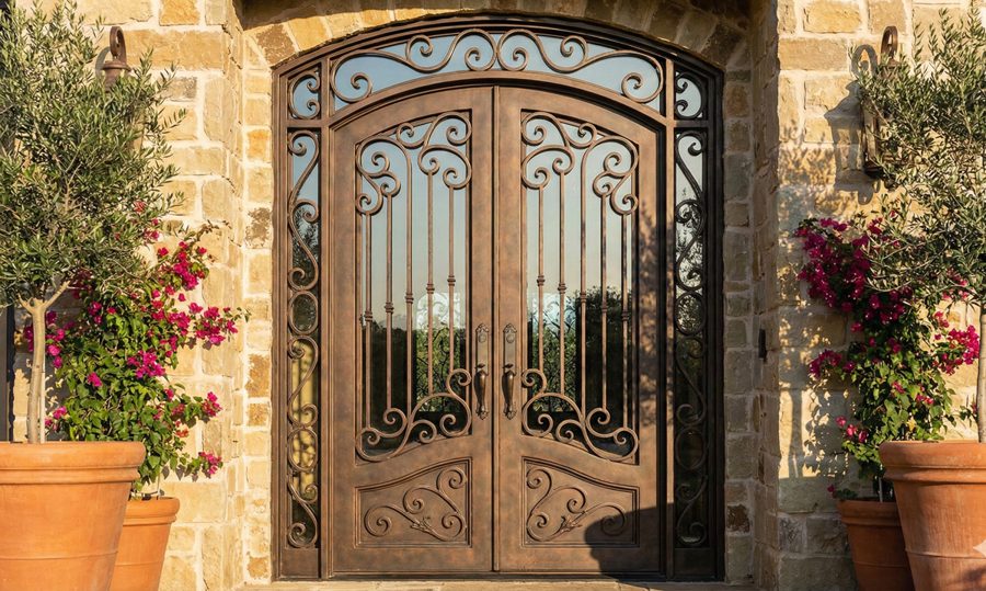 Custom wrought iron door and driveway gate